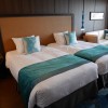 「琵琶湖ホテル」ラグジュアリーフロアアクアの部屋、ベッド